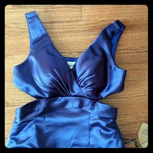 Purple cocktail dress with side cutouts